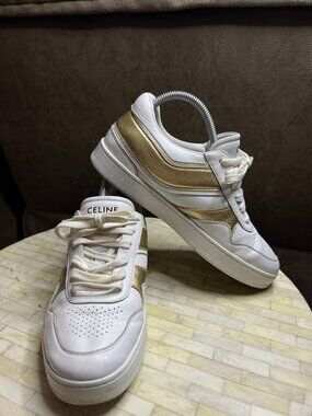 CELINE Trainer Low Lace-Up Sneakers in Optic White and Gold